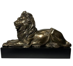 Kaide Üzerine Uzanmış Aslan Biblo